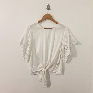 White shirt with flower cutout sleeves